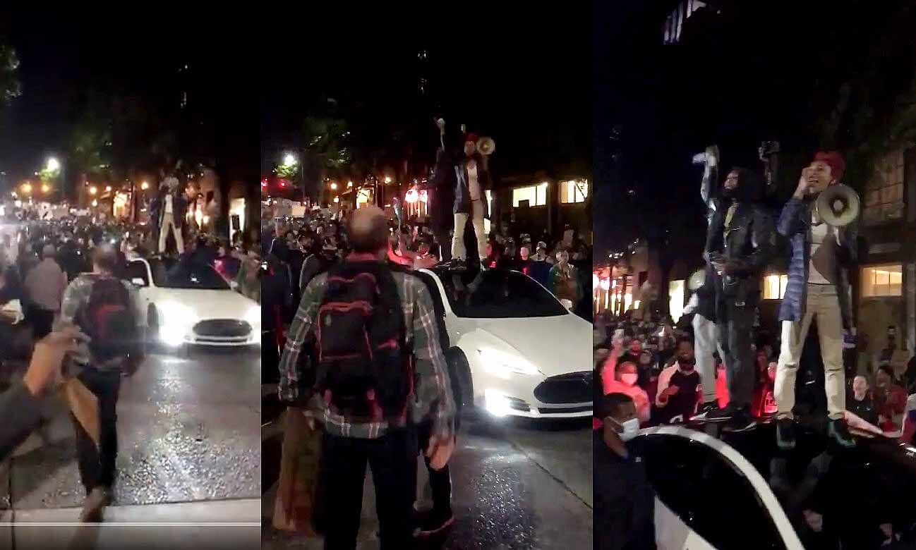 Tesla Model S присоединяется к ралли Capitol Hill, поддерживает четырех протестующих со стеклянной крышей