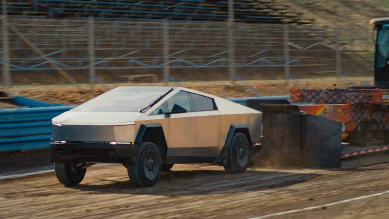 Tesla Cybertruck tested in tractor-pulling with competitors Ford and Rivian