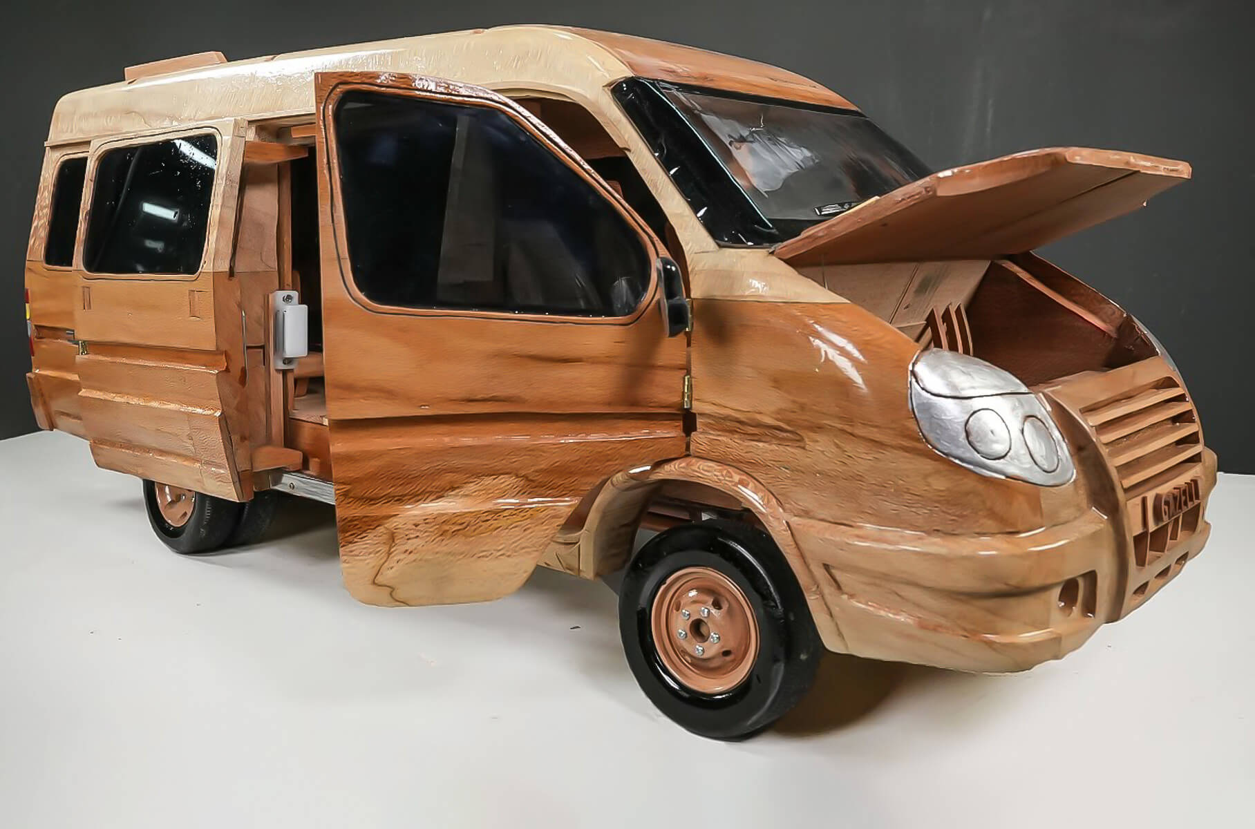 Cars made of wood that copy real models