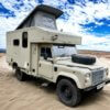 A military medical Land Rover Defender was destroyed in battle, but then restored and turned into a camper.